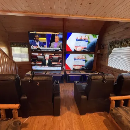Entertainment Cabin: with 8 Large Screen TV's on 1 Wall.  Great for Small Groups