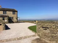 Law Brook Farm cottage with stunning views .