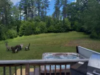 NEW for 2024, 6 person hot tub. Spacious country home with large back yard.