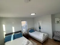 Relax with family or friends to this elegant apartment in the heart of Waltham Hotels in Waltham