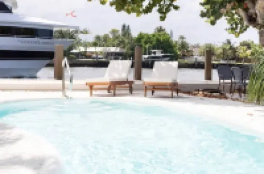 Beautiful Waterfront Condo on Canal with Pool & Walk to Beach! Boat Watch! 2b/2b