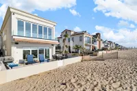 Located directly on the Sand. Two Master Suites, four bedrooms, four bathrooms.