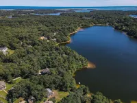 Lakefront retreat w/ deck, dock, sandy beach, 4 watercraft, <6 mins to 2 beaches