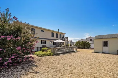 Original Cape set between the Beach and the Bay Hotels near Long Beach Island Library