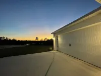 Quiet sunsets next to the river. Bring your fishing poles the bass are biting!