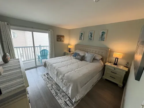 Cozy and Clean Boardwalk/Beach Block Condo with Parking and Pool