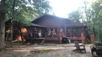 Private lakefront getaway with a sandy beach below the back deck! - Wifi