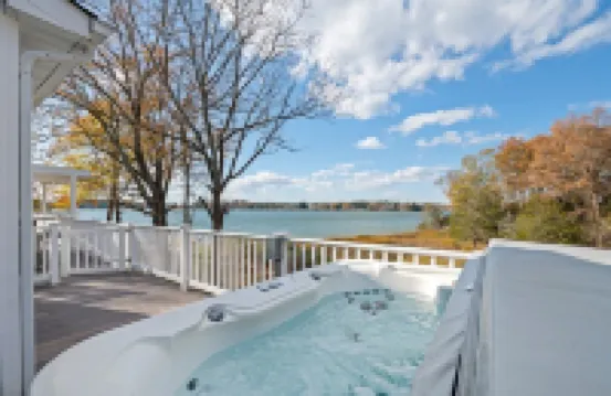 Water front Oasis with pickle-ball court and hot tub