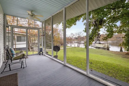 TWO homes on Black River Lake with TWO boat slips!