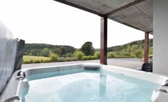Classy Holiday Home in Martilly with Hot Tub