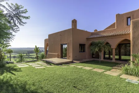 Amendoeira Golf Resort Отели в г. Силвиш