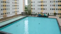 Homey 2Br at Puncak Permai Apartment Hotels in Dukuhpakis
