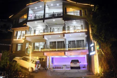 J P Regency Отели рядом с достопримечательностью «Shree Kainchi Hanuman Mandir»