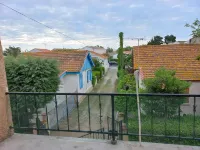 Apartment with balcony upstairs of a villa 300 m from the sea