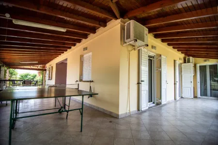 Spacious Villa with heated pool that becomes indoor Отели в г. Асина