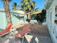 Palm trees, Private pool, Minutes from fabulous beaches.
