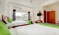 Treebo Atithi Comforts, 1 Km from Nisargadhama Forest Hotels in Baichanalli