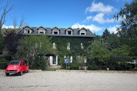 Le Moulin de Barette - Proche le Puy-en-Velay Отели в г. Сен-Венсан
