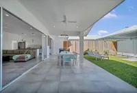 Tropical Private Oasis with heated pool just a short walk away from 4 mile beach