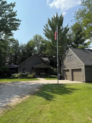 Private Cottage on Manistee Lake with beautiful lake views and sunsets.