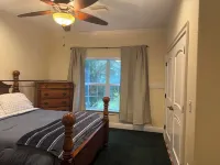 Escape to this serene 4-bedroom home set on 10 private acres.