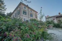 Historic villa with swimming pool surrounded by nature