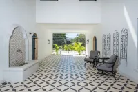 Super lux 5-bedroom, 7 bath house in beautiful Playa Grande with golf cart!