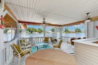 Relaxing Lakeside Retreat With Boathouse, Dock, Deck, Firepit and Screened Porch - 4-Star
