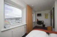 Hotel Tórshavn Hoteles cerca de Viðarlundin