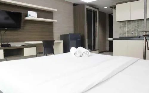 Prime and Comfy Studio at Tamansari la Grande Apartment by Travelio