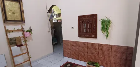 Rumah 4 Kamar w/150 Mbps & Home Theater Отели в г. Sei Selayur