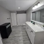 A clean luxury suite on a lakeside view with city amenities within 5 minutes. Hotels in St. Clair County