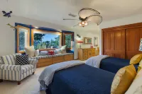 A private oasis to relax and play in the comfort of a gated 2-acre estate.