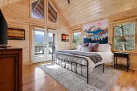 Spectacular view, hot tub, 2 fire pits, game room, dog-friendly!