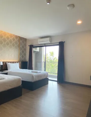 ห้องดีลักซ์เตียงแฝดพร้อมลานระเบียง