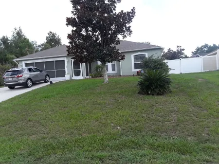 Beautiful 4 BR/2BA Private Pool Home Near Weeki Wachee Springs Отели рядом с достопримечательностью «Уики Уэши Спринг»