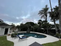 Remodeled cozy family surf house with jacuzzi and pool located near the beach!