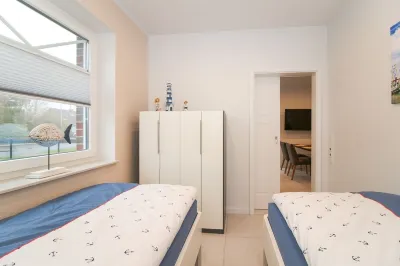 Semi-detached house for up to 8 people between Norden and Norddeich Hotels near Norden Altstadt