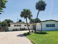 Beach house with HEATED pool one block from the beach!