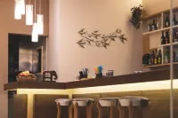 Helios Apartments - bar