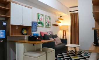 Tranquil Designed and Homey 2Br at Springlake Summarecon Bekasi Apartment