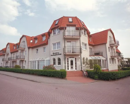 Apartment "Lachmöwe" // WLAN, sauna, fitness room, 2 Gazelle bicycles Hotéis em Norderney