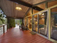 Charming Cabin with Hot Tub and Riverside Fire Pit - Inviting Retreat