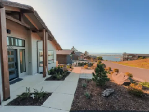 Stunning Bay Views and Cozy Amenities - Modern Coastal Getaway