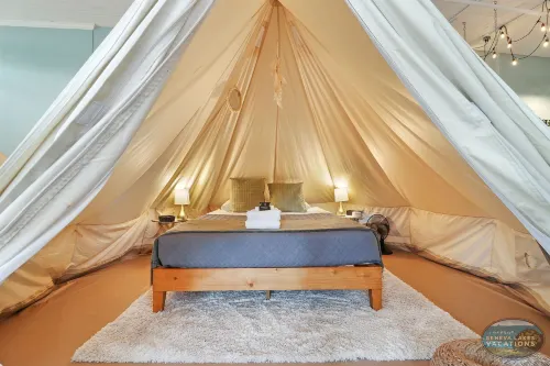 Experience Stay at the Glamping Loft Lake Geneva |Group Stays |12 Stylish Tent Suites |Kitchen & Bar Hotels in Lake Geneva