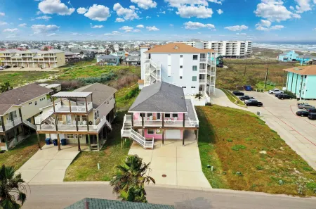 Steps to Beach Balcony Ocean View Golf Cart Zone Casa Rosada by AvantStay