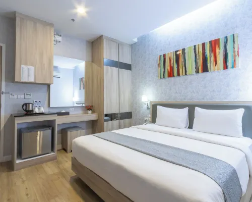 Leela Orchid Hotel guest room