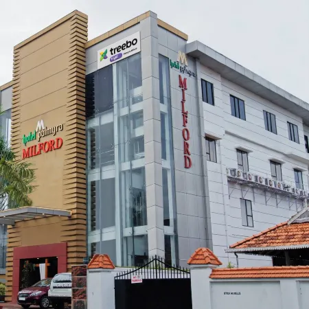 Treebo Premium Palmyra Milford, 2 Km from Alleppey Beach Отели рядом с достопримечательностью «Железнодорожный вокзал Аллеппи»