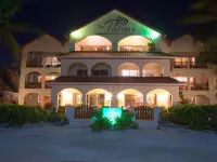 The Palms Oceanfront Suites Hotels near John Greif II Airport
