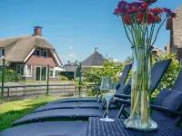 Villa in Friesland with Waterfront Garden Hotels in De Friese Meren